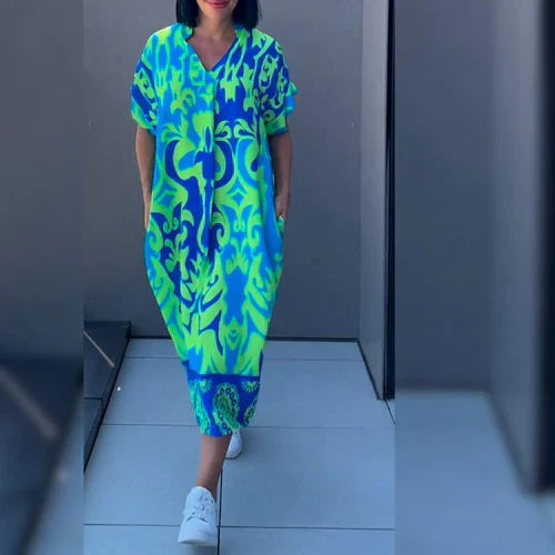 Monica | Elegancka sukienka w kwiaty zapewniająca romantyczny i wyrafinowany wygląd