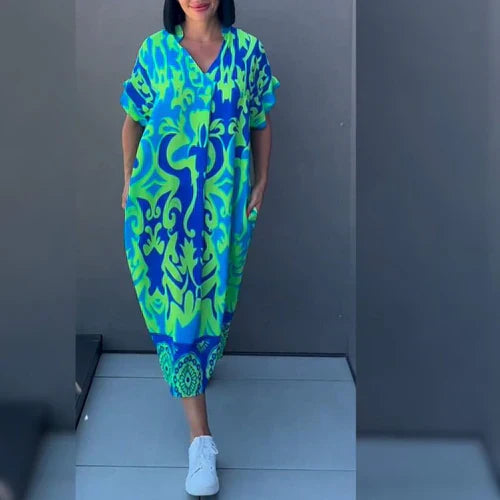 Monica | Elegancka sukienka w kwiaty zapewniająca romantyczny i wyrafinowany wygląd