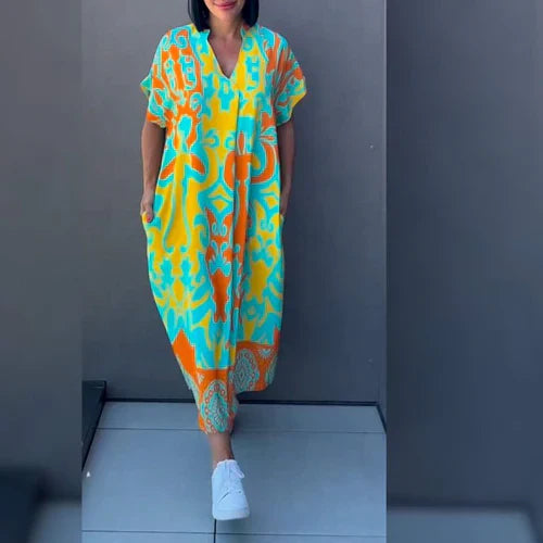 Monica | Elegancka sukienka w kwiaty zapewniająca romantyczny i wyrafinowany wygląd